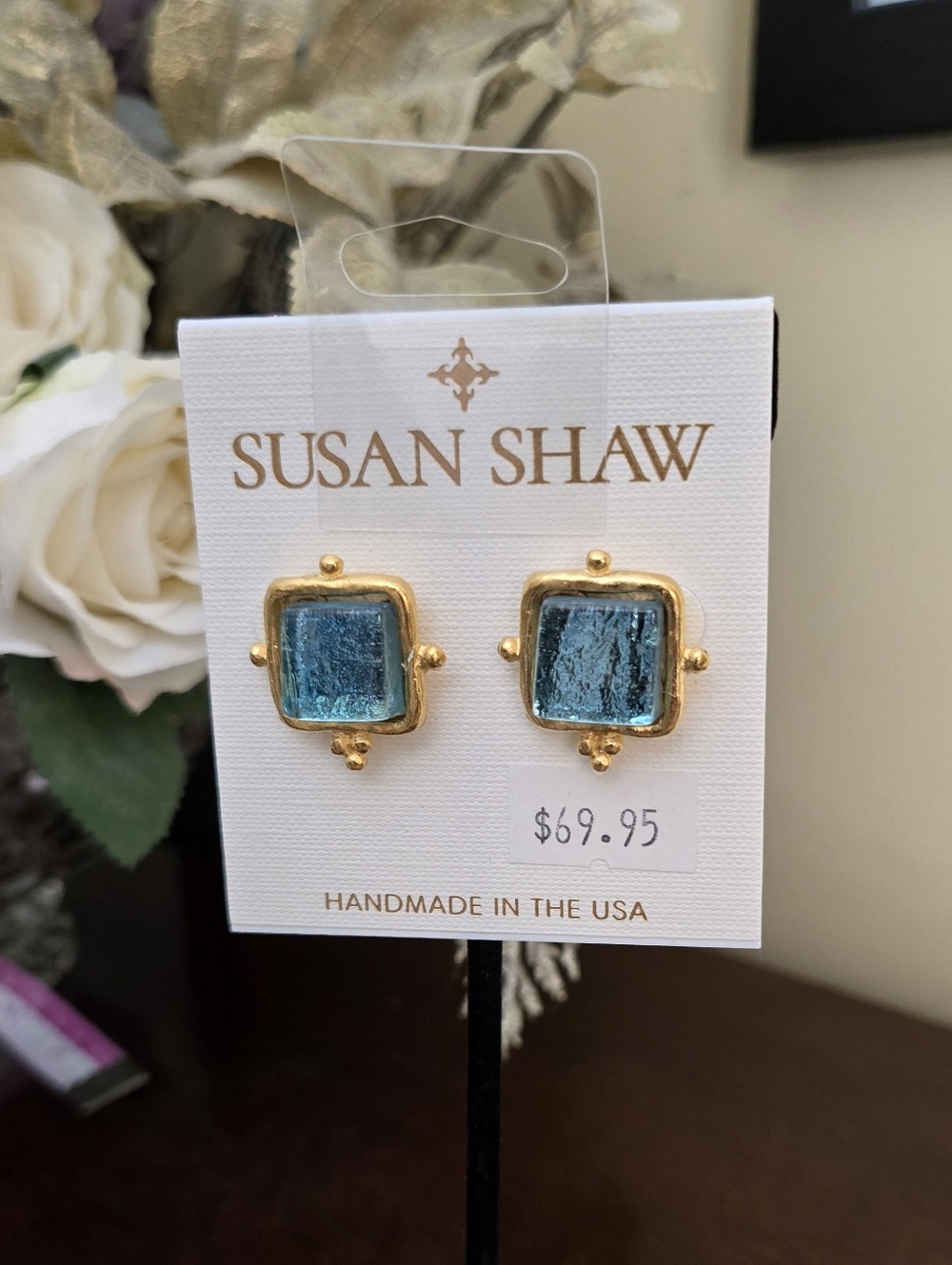 Artisan earrings by Susan Shaw with luminous aqua-blue glass cabochons